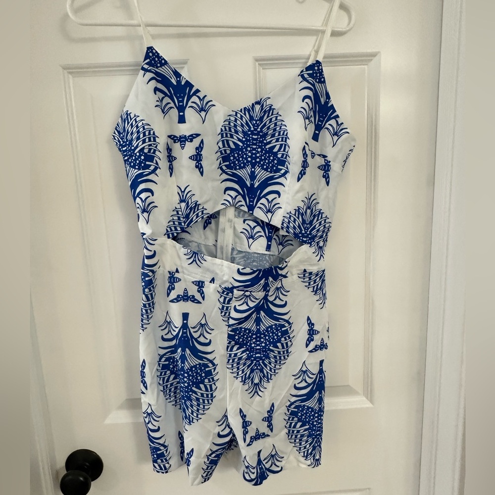 White and blue romper. NWT.